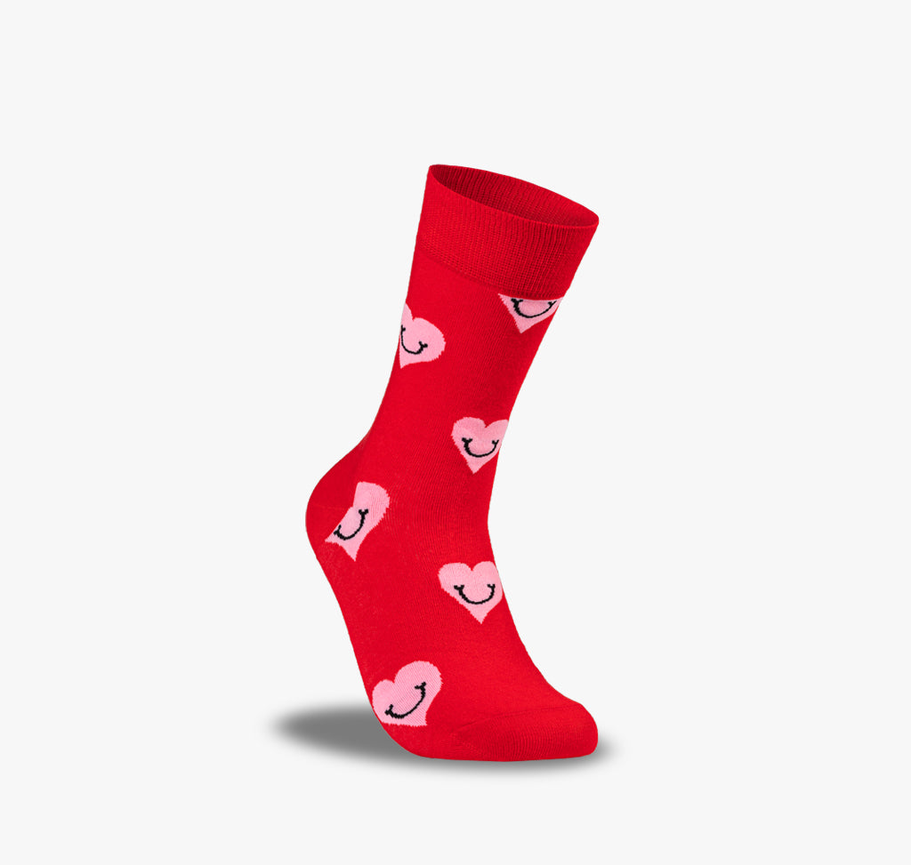 Rote Herren und Damen Socken mit lachenden rosa Herzen